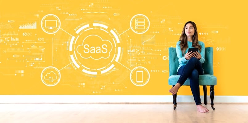 Woman in chair next to SaaS icons realizes benefits of contract management